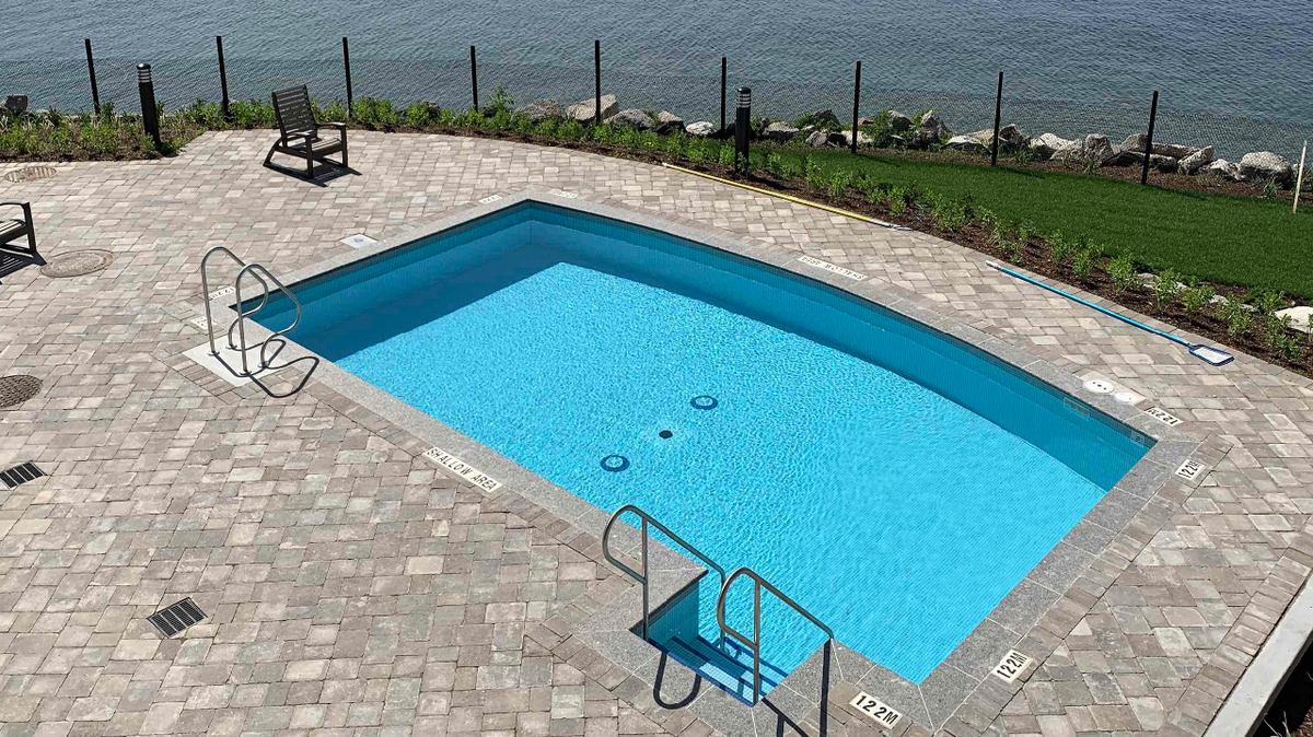 Lakeside pool at Orchard Point Harbour Condos in Orillia, Ontario